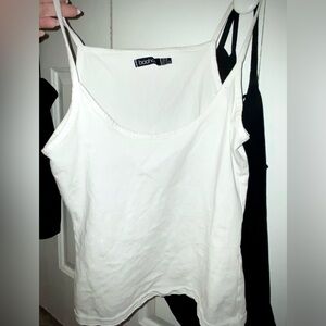 Bundle of 3 camis. Size 6 and 8 . 2 black 1 white from boo hoo